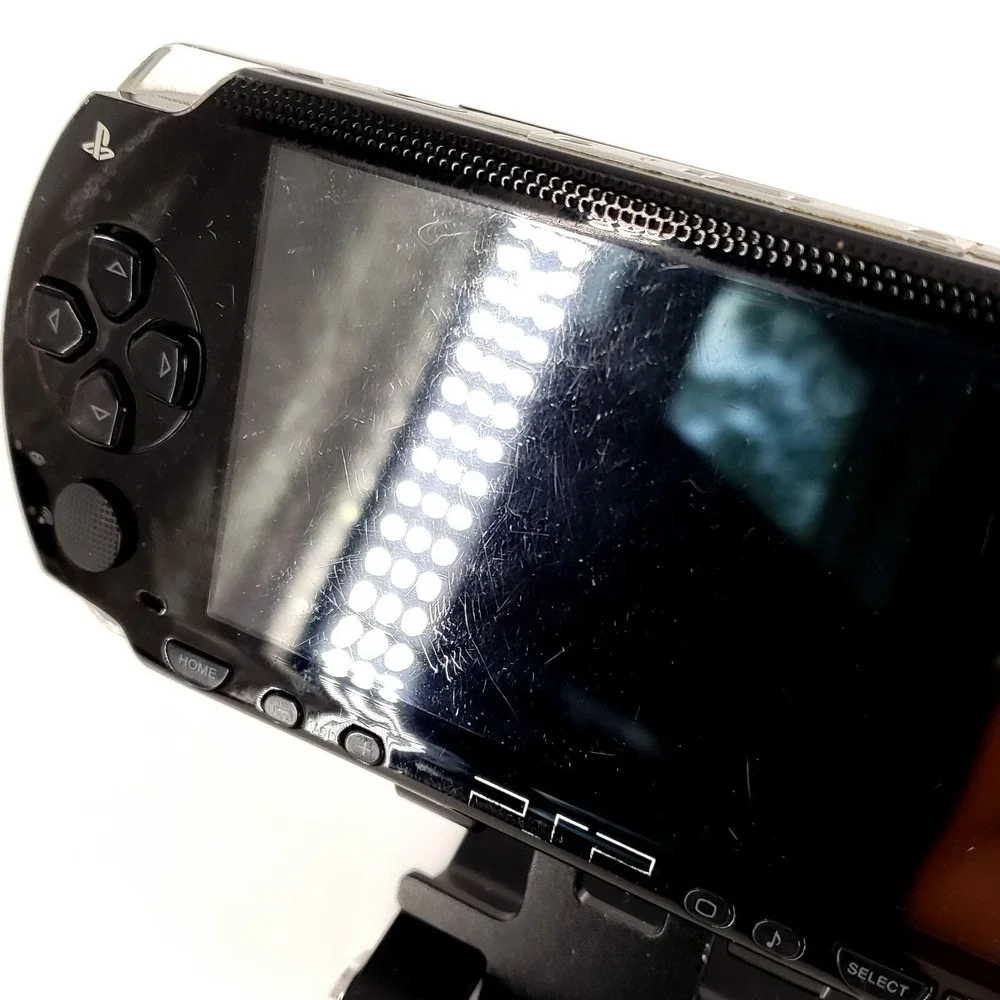Sony PSP 1000 Handheld System Bundle Black w/ 5 UMDs, 32GB Memory Card Tested